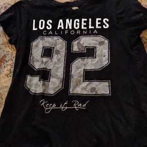 This shirt is a piece of girl clothing size large